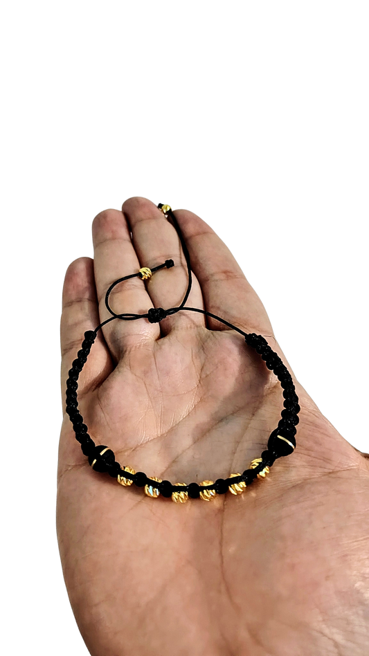 Pulsera Negra con Neopreno y Balines Dorados 18K